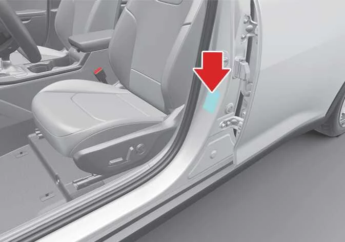Location of the Kia K4 tire pressure information label on the driver-side center pillar